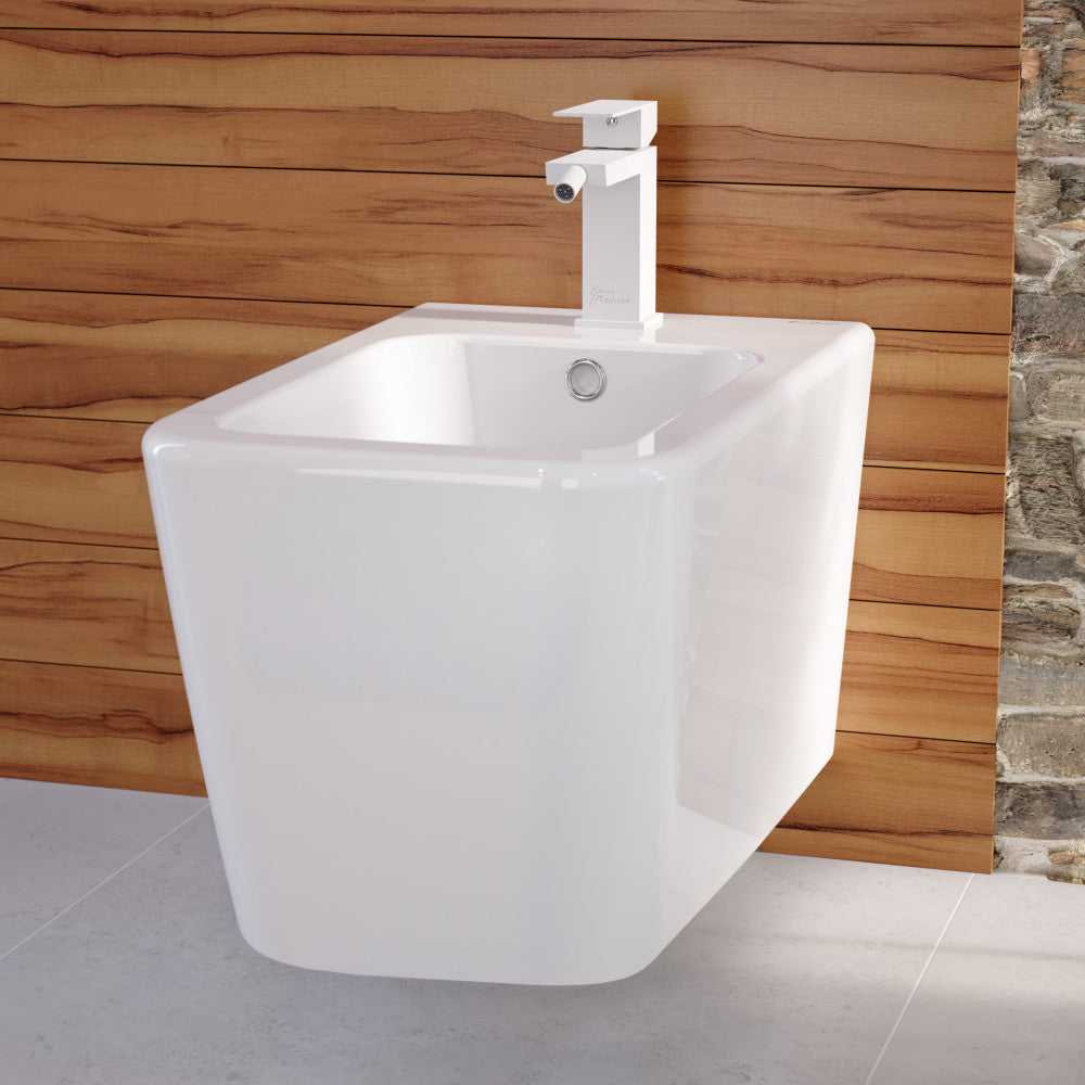 Single-handle bidet faucet in matte white with sleek rectangular spout and lever handle.