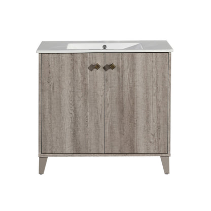 36-inch freestanding bathroom vanity in gray oak with single sink and two-door cabinet.