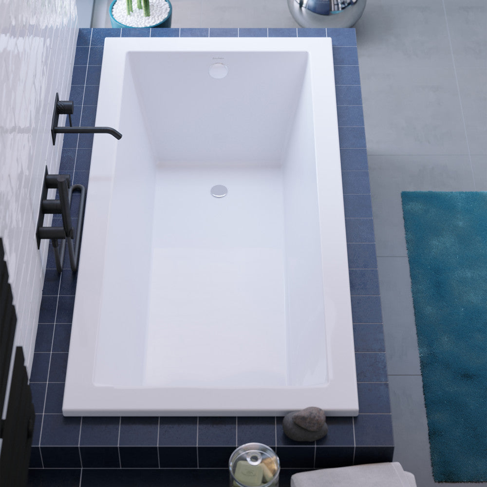 Drop-in white rectangular bathtub 60x30 inch with reversible drain and flat rim.