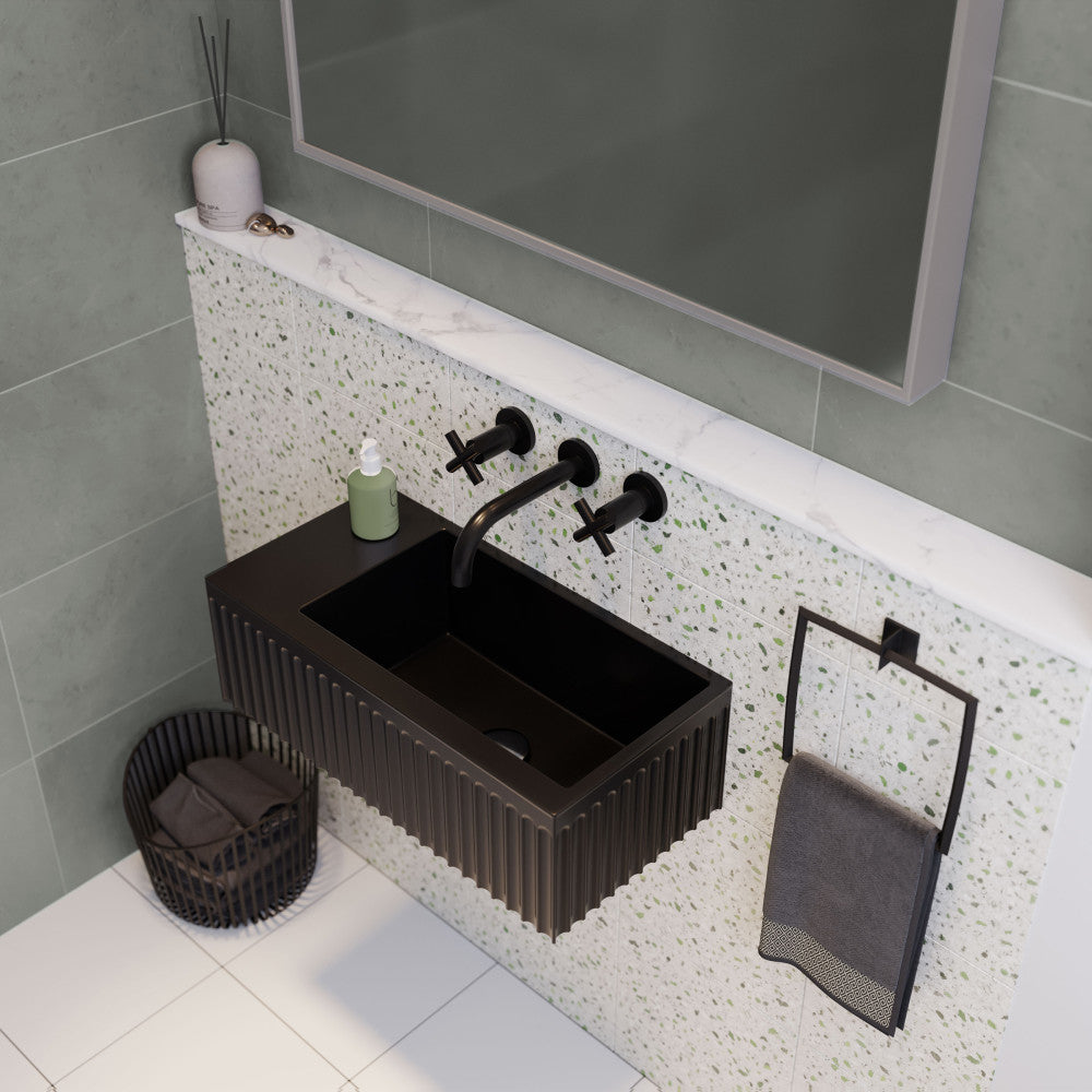 24" wall-mount bathroom sink in matte black with rectangular shape and grooved front panel.