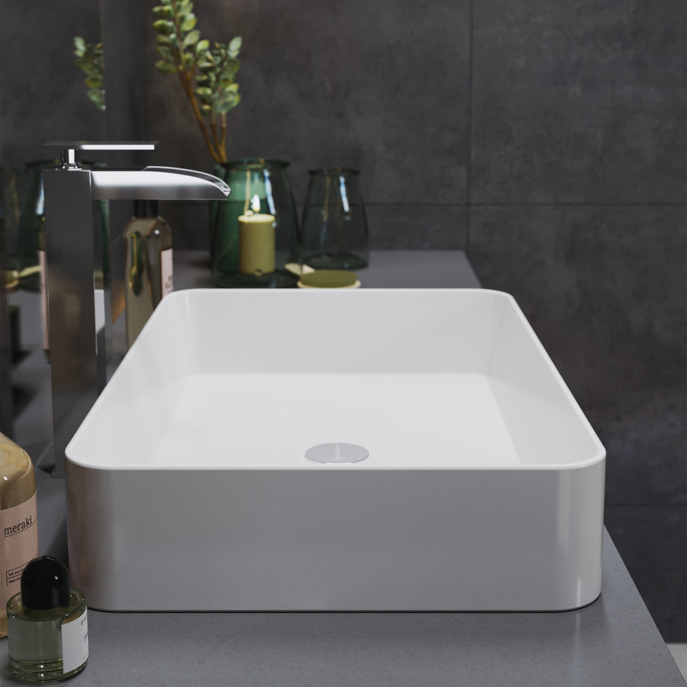 White rectangular ceramic vessel sink, modern minimalist design, flat bottom, thin walls.