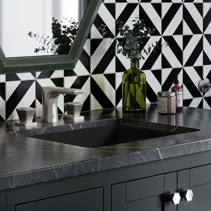 18.5" rectangular undermount bathroom sink in matte black with sleek modern countertop cutout.