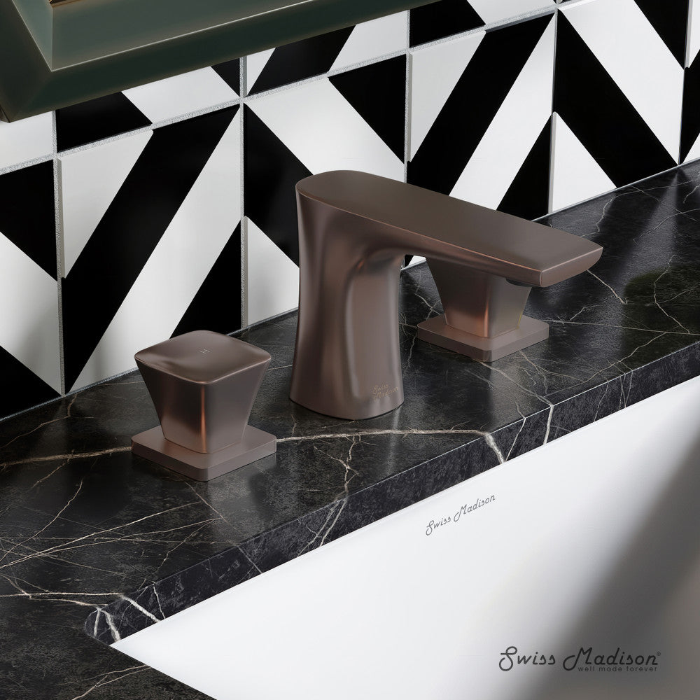 Widespread bathroom faucet in oil rubbed bronze, 2-handle design, sleek angular spout and lever handles.