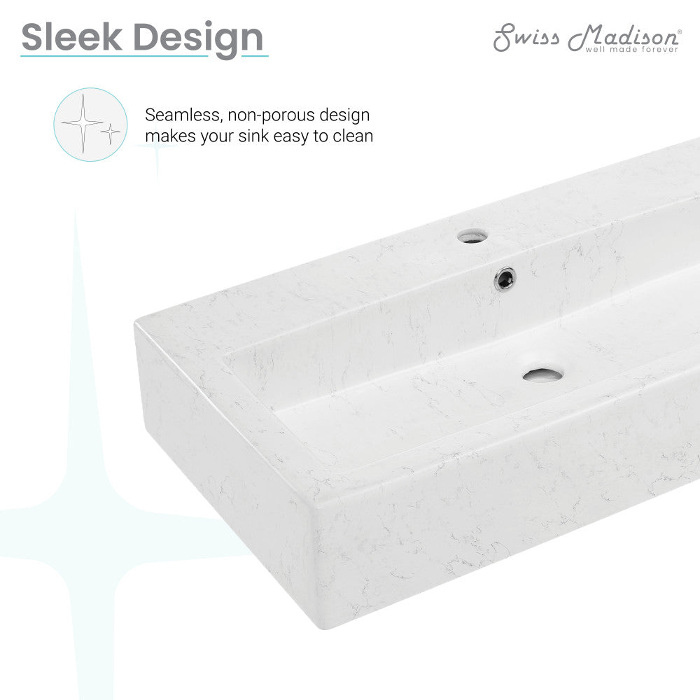 Voltaire wide rectangle vessel sink in static marble with seamless, non-porous design for easy cleaning.