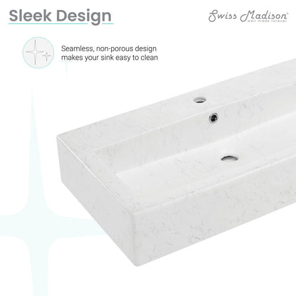 Voltaire wide rectangle vessel sink in static marble with seamless, non-porous design for easy cleaning.