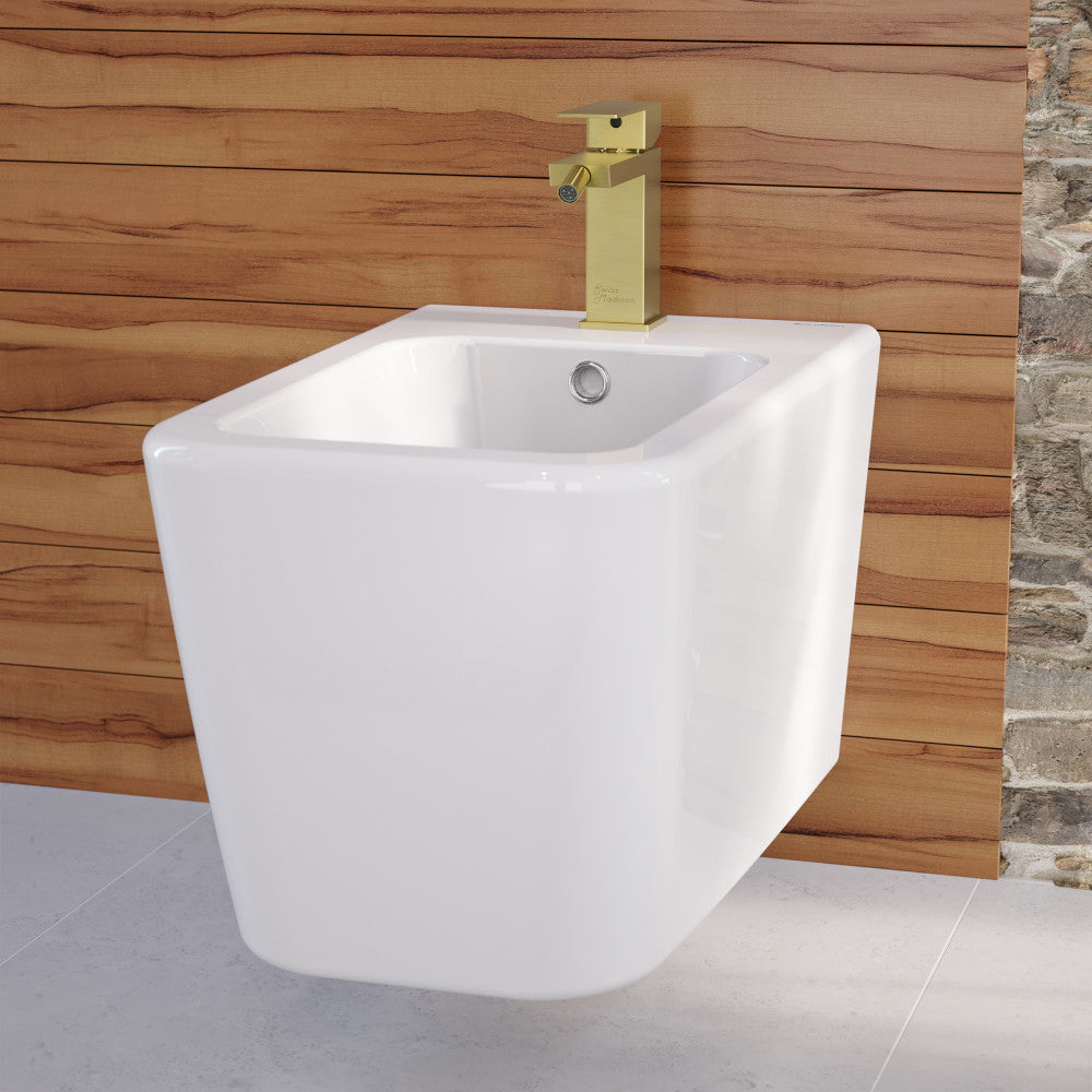 Wall-mounted bidet faucet in brushed gold, single handle.
