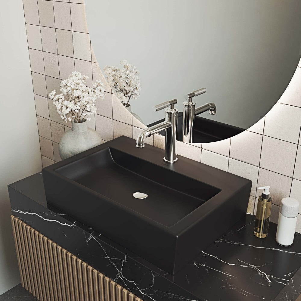 Matte black rectangular ceramic vessel sink with smooth matte finish and clean modern edges.