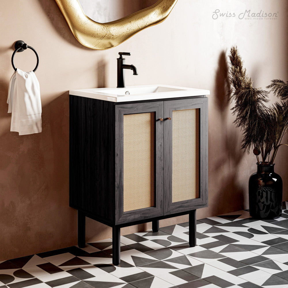 24-inch freestanding black oak bathroom vanity with single sink and woven door panels.