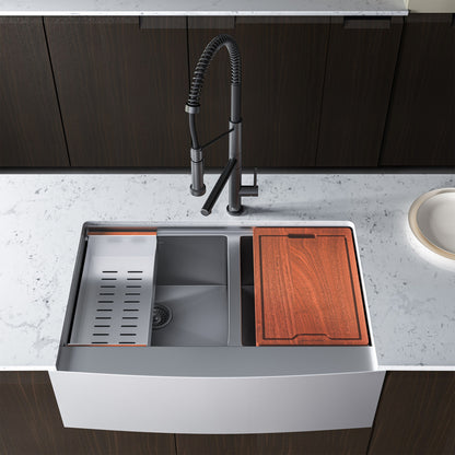 33 x 22-inch dual basin farmhouse workstation sink with apron front and included cutting board and colander accessory.