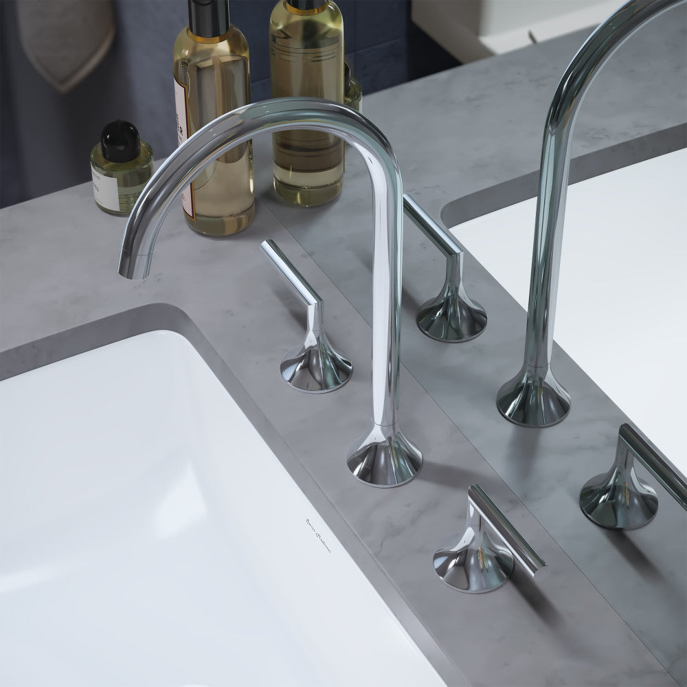 Widespread bathroom faucet in chrome with curved spout and two cross handles on gray countertop.