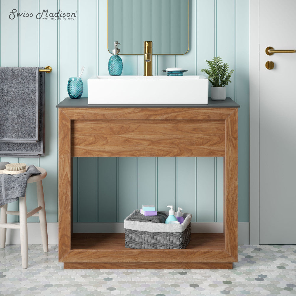 36-inch freestanding bathroom vanity in natural teak with single sink and open storage shelf.