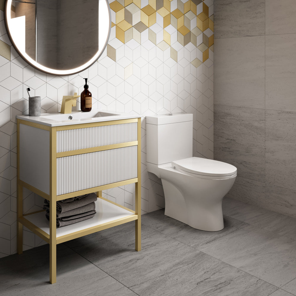 24-inch white freestanding bathroom vanity with single sink and gold metal frame.