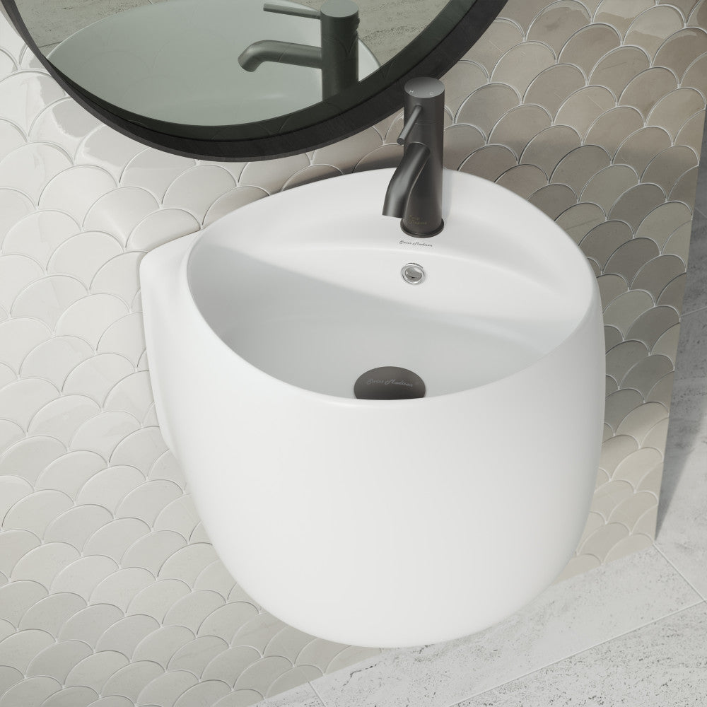 Wall-mount bathroom sink in matte white with curved front and integrated overflow hole.
