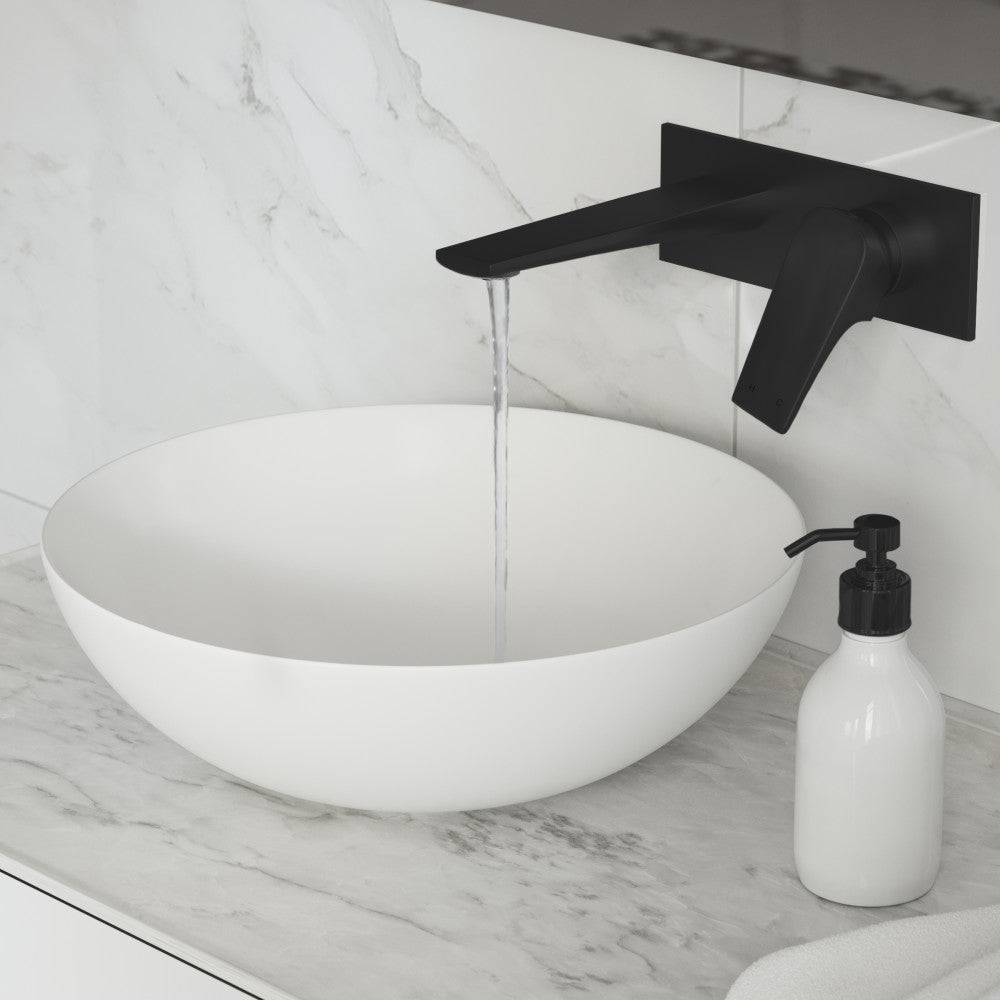 Wall-mount bathroom faucet in matte black, single-handle, modern angular spout design.