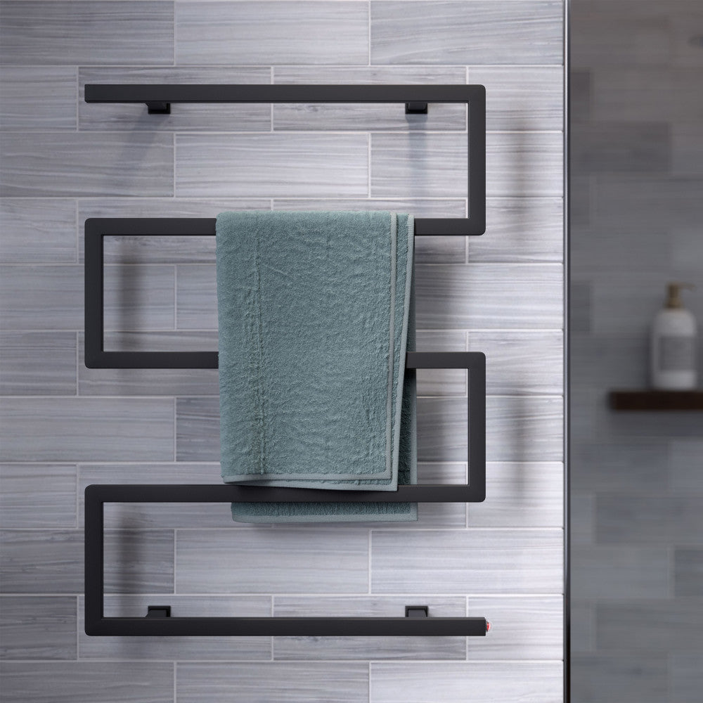 Electric 5-bar towel warmer in matte black with modern geometric design mounted on tiled wall.