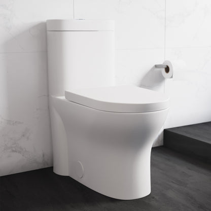 Elongated one-piece toilet with dual-flush, smooth skirted trapway, modern white ceramic design.