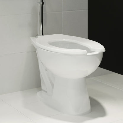Elongated floor-mounted commercial toilet bowl with top flush spud flushometer, white ceramic.