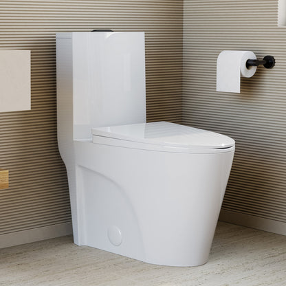 Elongated one-piece toilet with dual vortex flush and black hardware in a modern bathroom setting.