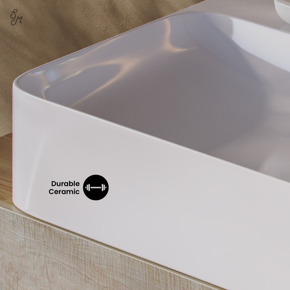 Glossy white rectangular ceramic vessel sink with faucet mount, 32-inch size, smooth curved edges.