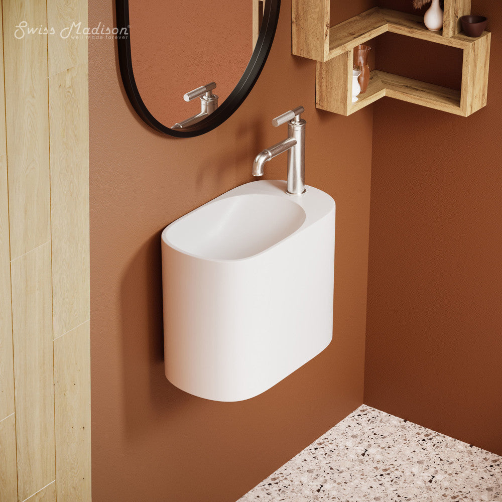 18" white wall-mount bathroom sink with right side faucet hole, compact modern design.