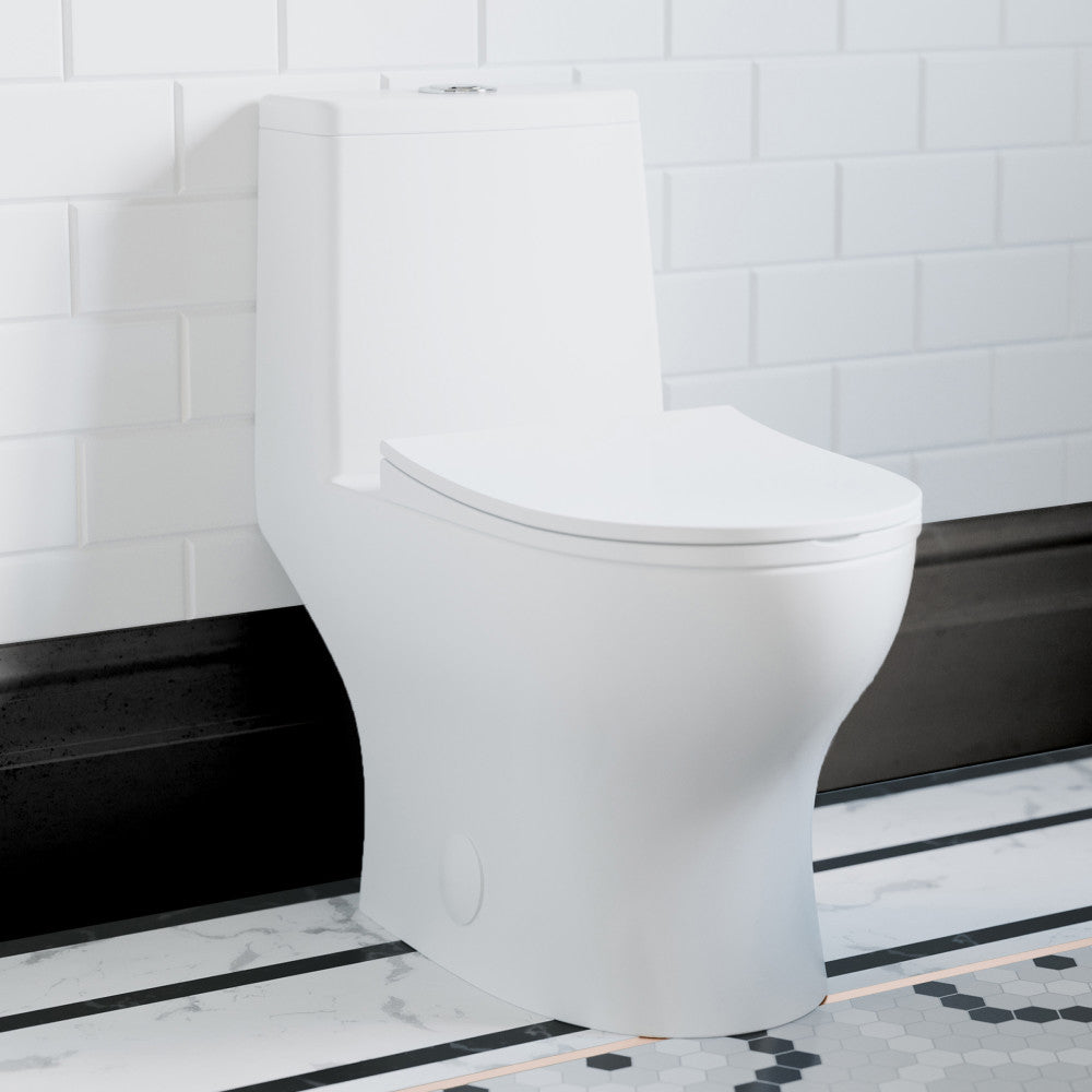 Elongated one-piece toilet with skirted trapway and soft-close seat, white ceramic.