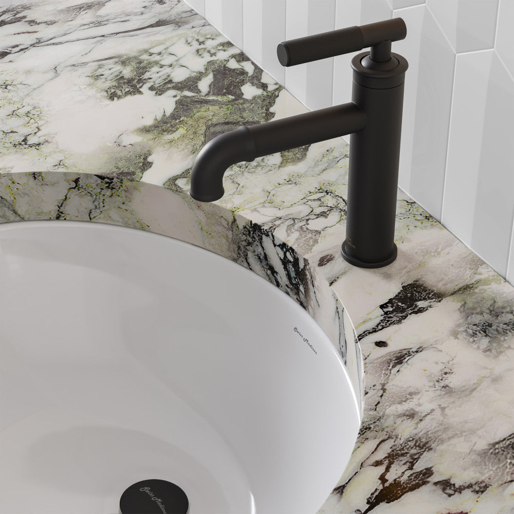 Single-handle bathroom faucet in matte black, sleek cylindrical design with lever handle on marble countertop.
