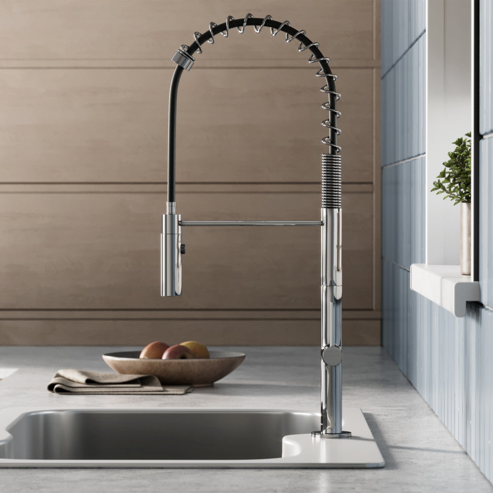 Single handle pull-down kitchen faucet in chrome with flexible coil spring spout.