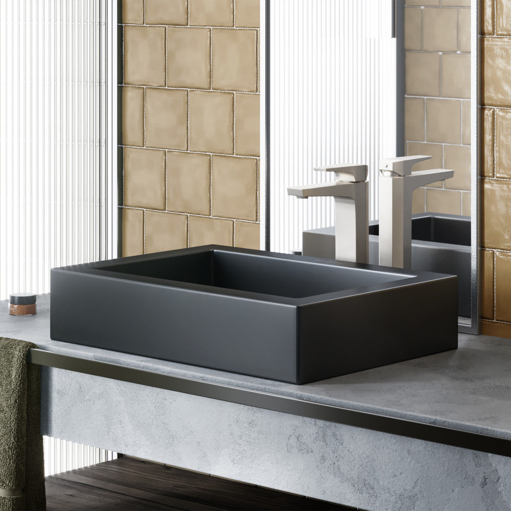Rectangular vessel sink in matte black ceramic, modern minimalist design.