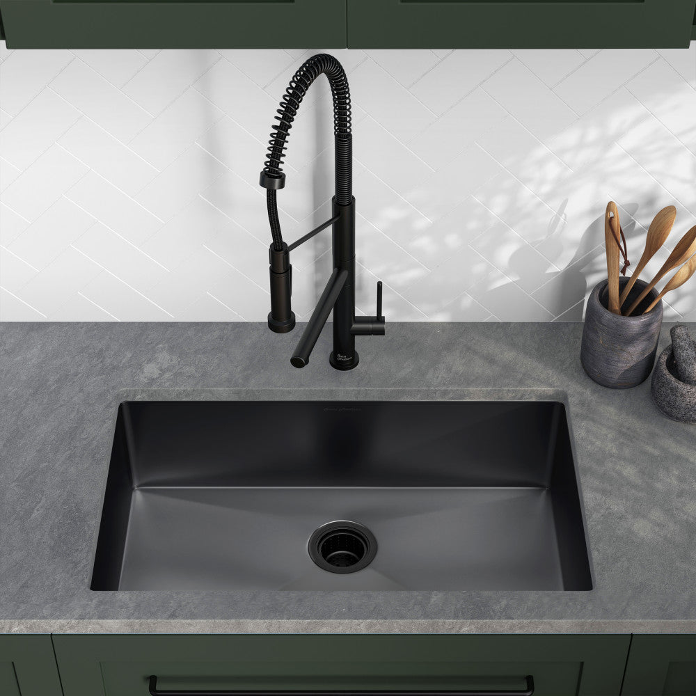 30x18-inch black stainless steel undermount kitchen sink, single basin with sleek matte finish and rounded corners.
