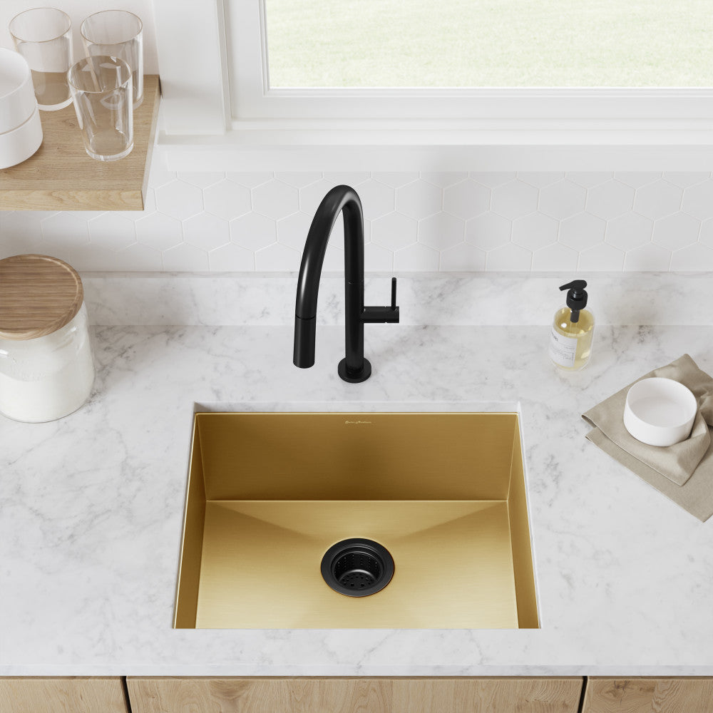 Single basin undermount kitchen sink in gold, stainless steel, 21 x 18 inches.