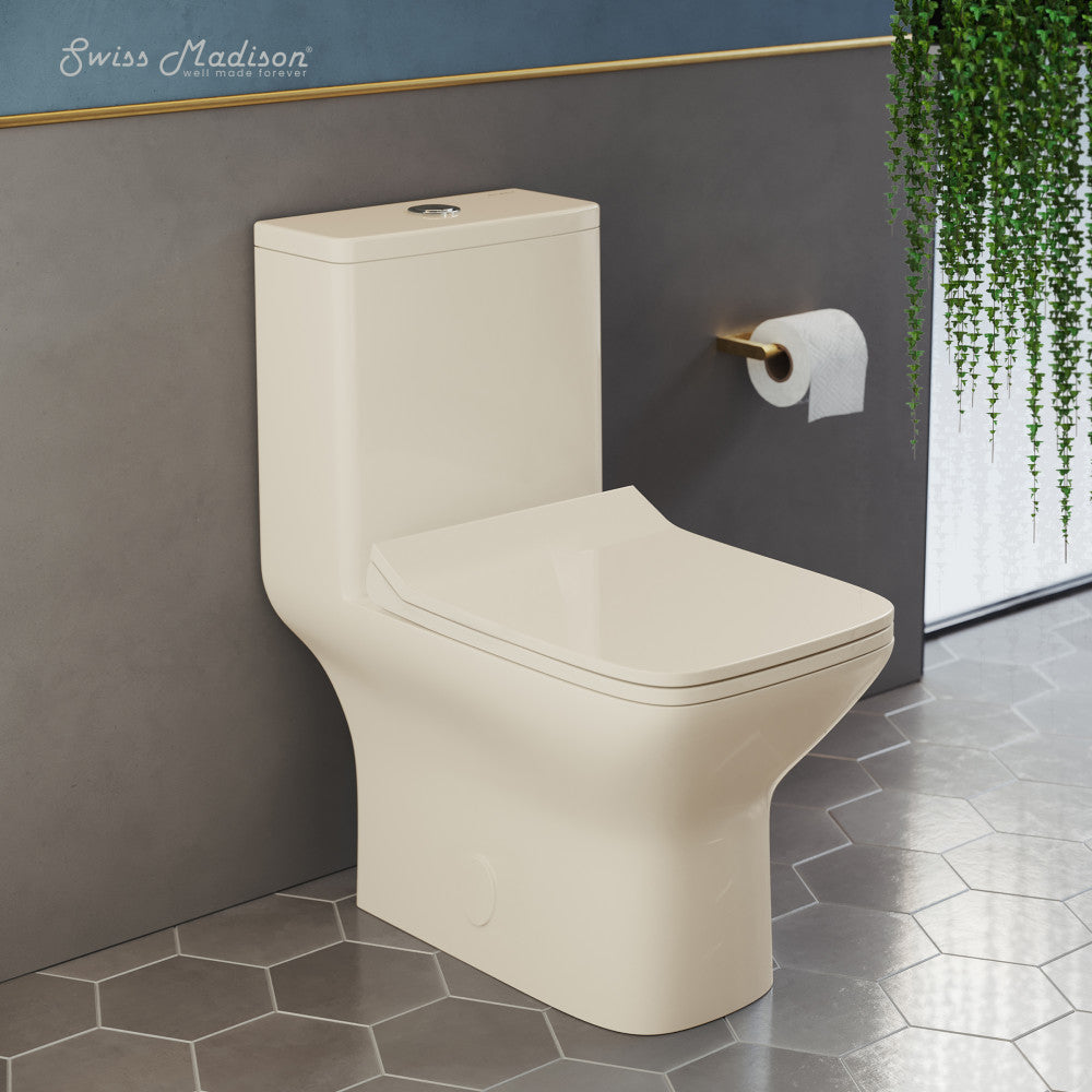 Elongated one-piece toilet in bisque, dual flush, sleek square design.
