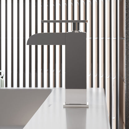 Single-handle waterfall bathroom faucet in chrome with sleek modern design and tall spout.