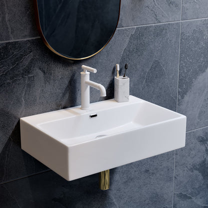 24" rectangular wall-mount bathroom sink in white with single-handle faucet and integrated drain hole.