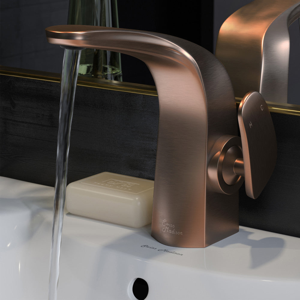 Single-handle bathroom faucet in oil rubbed bronze, sleek curved spout with lever handle.