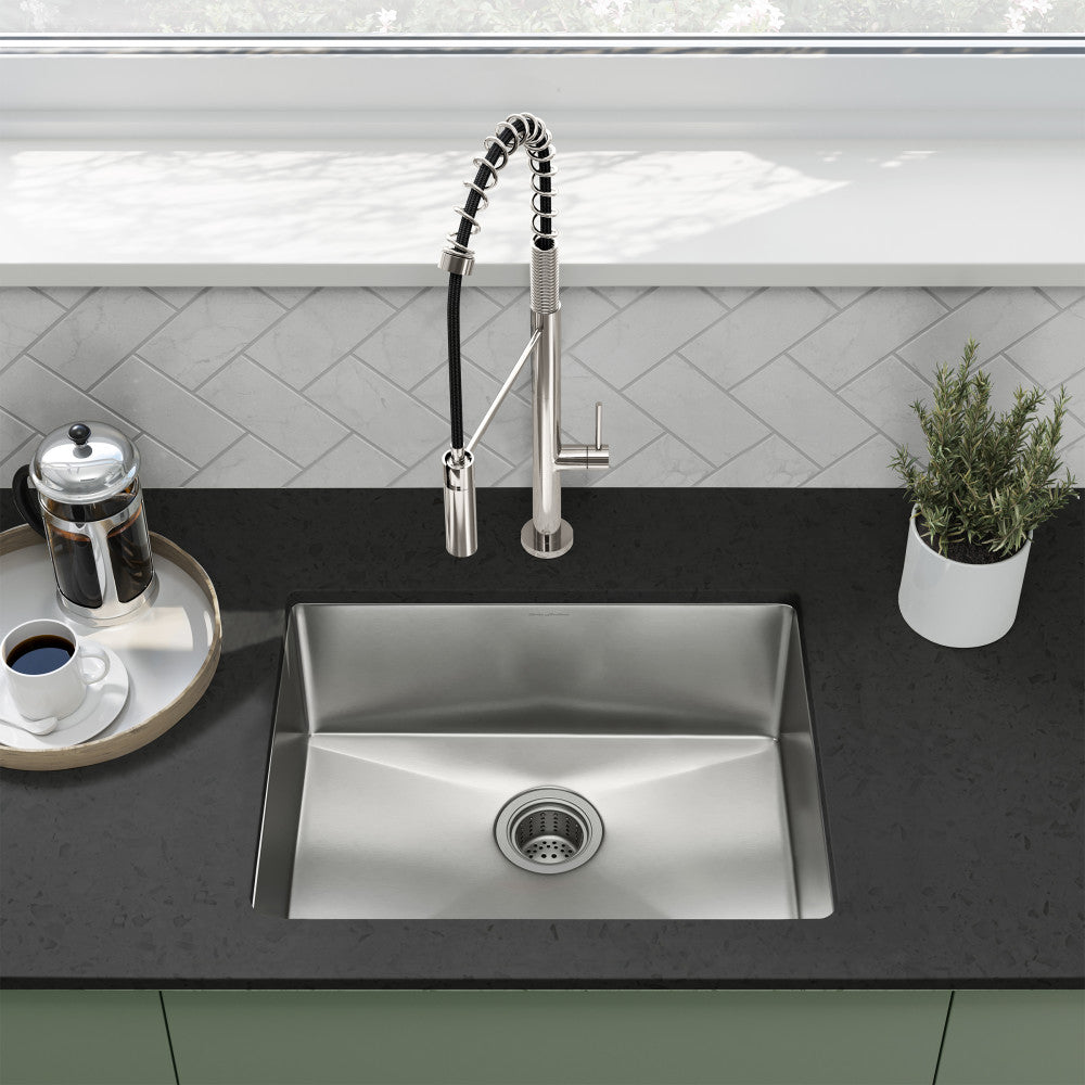 23" 16 gauge stainless steel undermount kitchen sink in polished chrome with single bowl design.