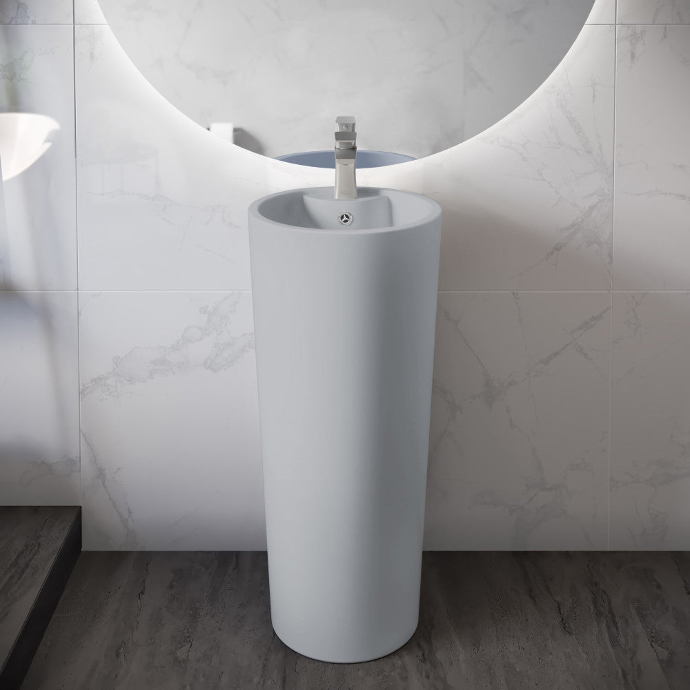 Circular pedestal sink in matte gray with a single faucet hole and smooth, modern design.