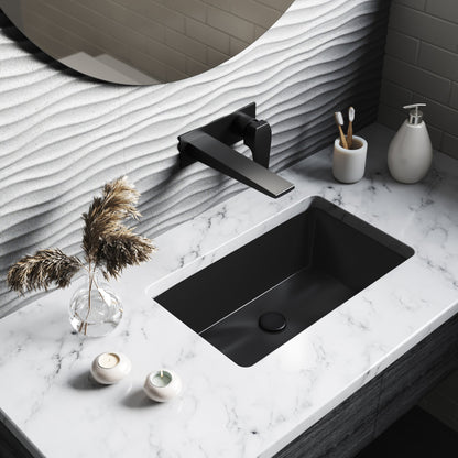 21" rectangular undermount bathroom sink in matte black with modern faucet on white marble countertop.