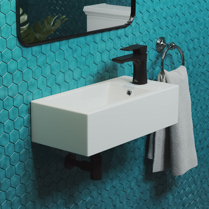 19.5x10 rectangular ceramic wall-hung bathroom sink with right-side faucet mount and matte black faucet.