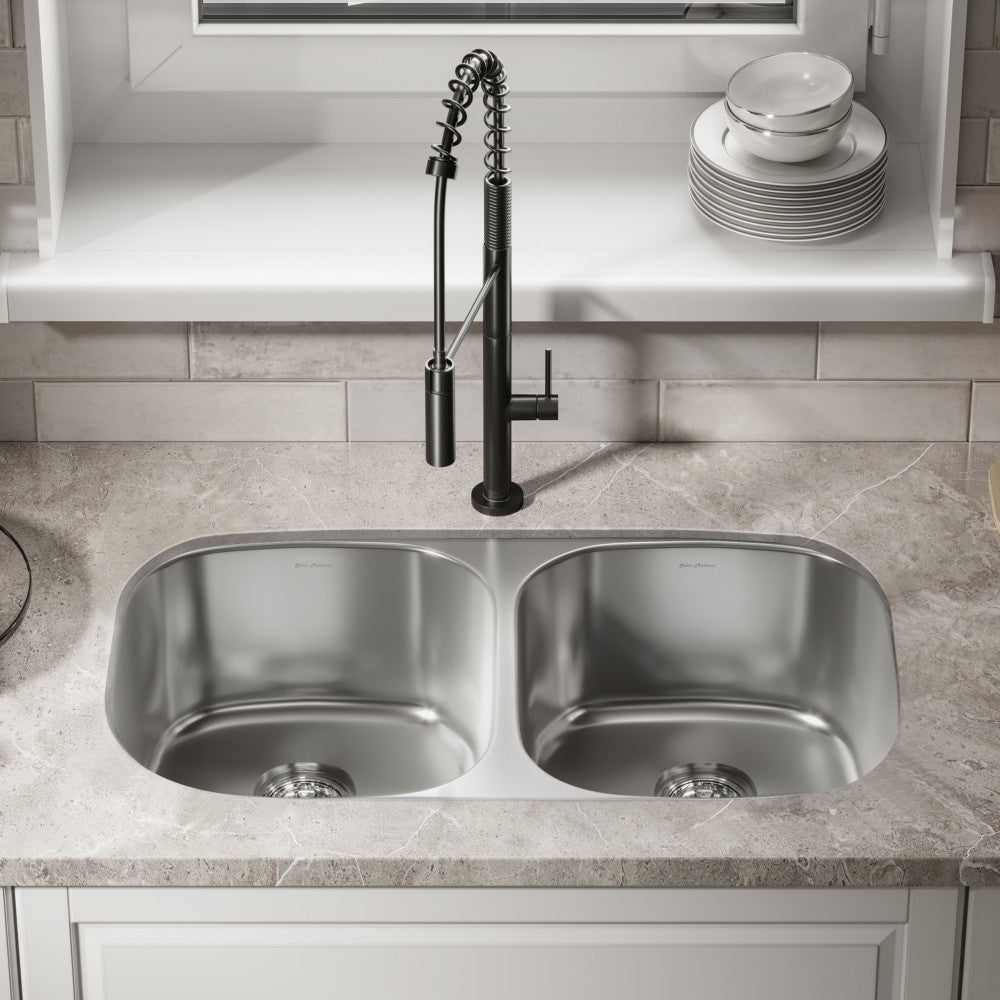 32 x 18 stainless steel undermount kitchen sink with dual rectangular basins and drain holes.