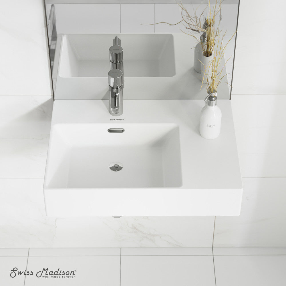 24 x 18 white ceramic wall-hung sink with left side faucet mount and rectangular basin.