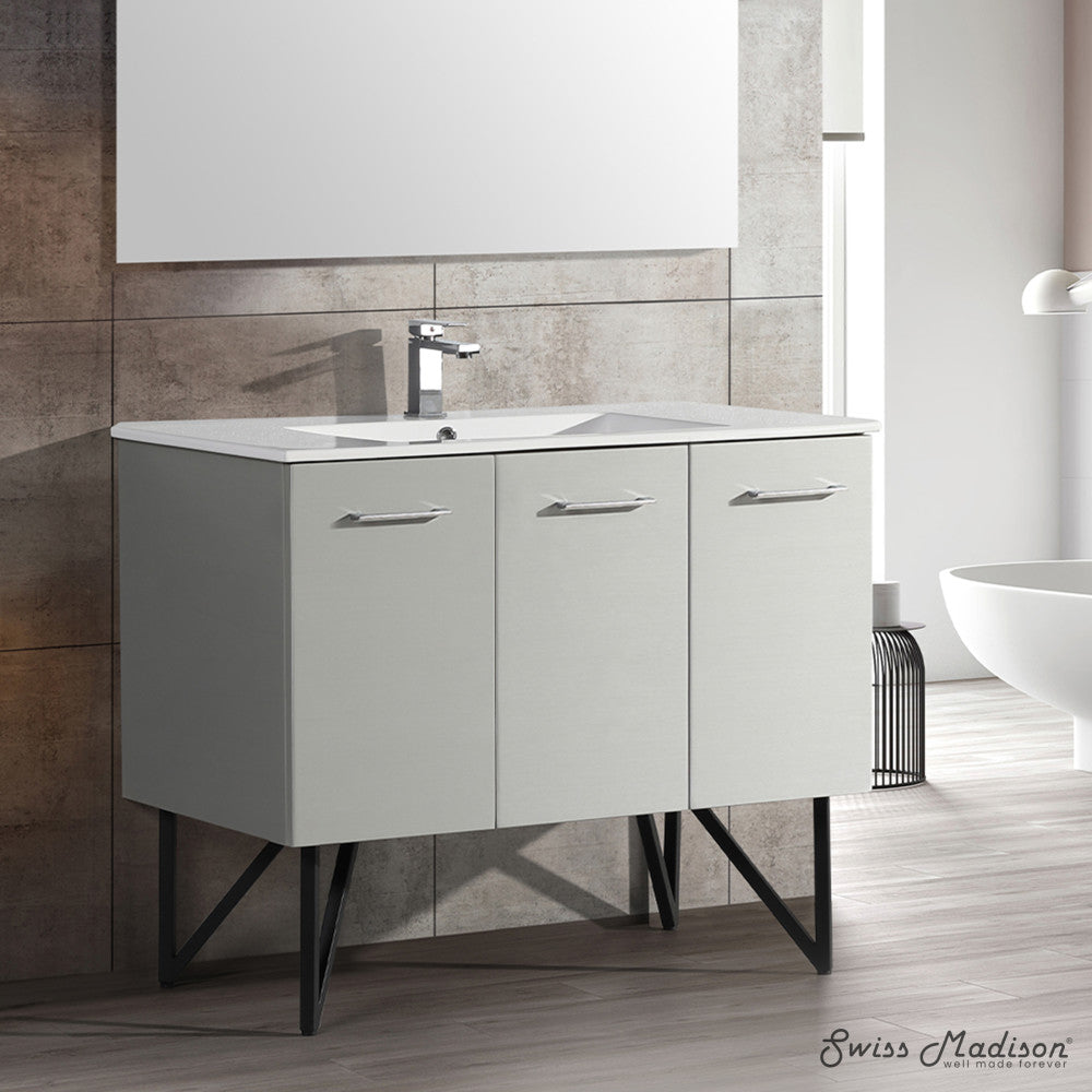 48-inch freestanding bathroom vanity in gray with single sink and soft-close doors.